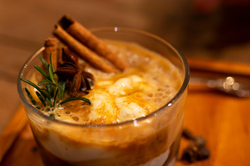 An Affogato is an Italian coffee-based dessert. It usually takes the form of a scoop of vanilla gelato or ice cream topped or drowned with a shot of hot espresso. Some variations also include a shot.