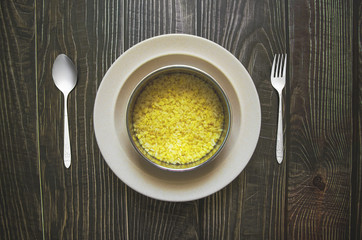 Boiled lentils inside bowl on table