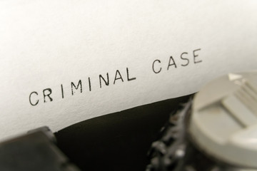 Close up printed text Criminal case on an old typewriter