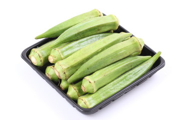 Fresh raw okra isolated on white background
