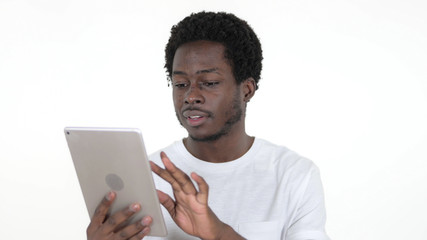 Casual African Man Browsing Interne on Tablet, White Background