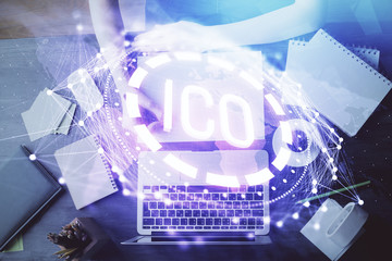 Cryptocurrency hologram over hands taking notes background. Concept of blockchain. Multi exposure