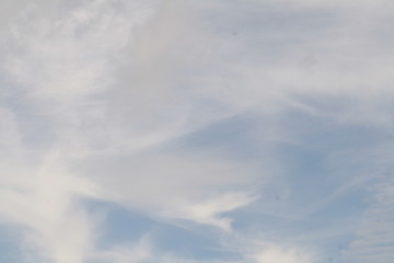 white clouds against a blue sky