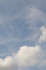white clouds against a blue sky
