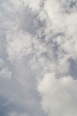 white clouds against a blue sky