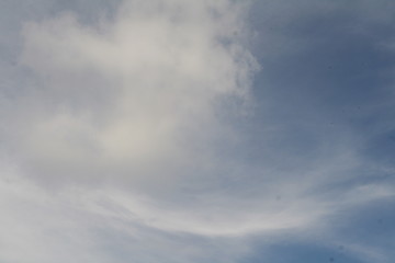 Obraz premium white clouds against a blue sky