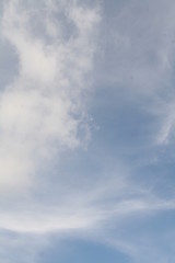 white clouds against a blue sky