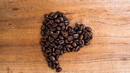 dark rose coffee bean, Black coffee cup on old wooden table top view.