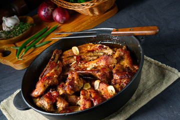 Spicy pork ribs with garlic and barbecue sauce