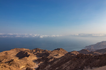 view through Canyon to the ocean along the coastal road to Salalah in Oman