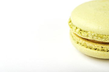 Green macaroni Cookies on a white background, isolated.