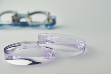 Optometrist medical equipment behind of eyeglasses lens.