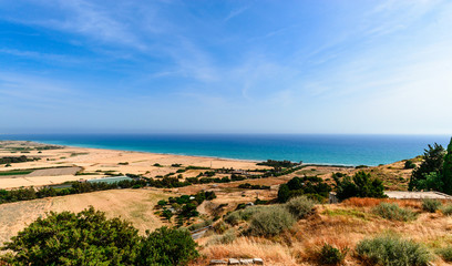 Minimal composition of sand and sea water. Aerial view. Copy space. Background for summer travel