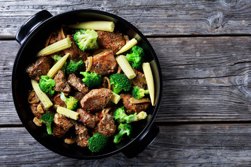 Pork chunks roasted in the oven with broccoli