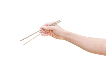 hand holding wooden chopsticks isolated on white background with clipping path.