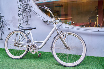 Fototapeta na wymiar The long-lived silver bicycle in Chanthaburi