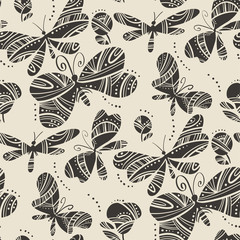 Linocut style dragonfly and butterfly pattern