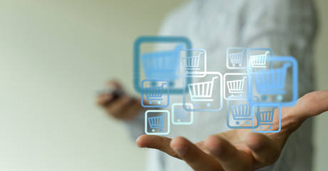 Shopping cart on digital tablet. Shopping online concept..