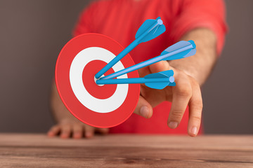 dart target arrow hitting on bullseye which is the ultimate goal that everyone wants.