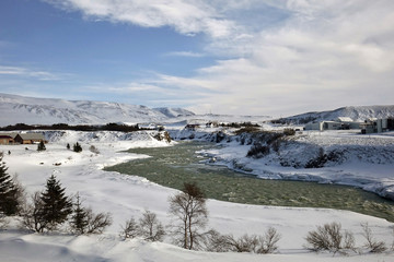 Fototapeta na wymiar Iceland. Landscape with river in wintertime 
