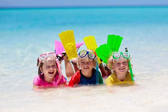 Kids snorkel. Children snorkeling in tropical sea.