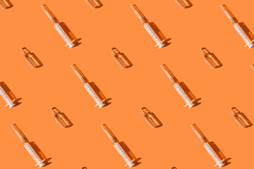 Creative pattern of syringe and ampoule for treatment various viruses symptoms or diseases.