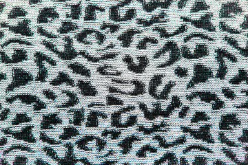  abstract pattern on fabric background of uneven zigzags