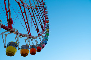 ferris wheel on blue sky