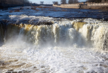 Waterfall on the river Narva. Variegated wide waterfall