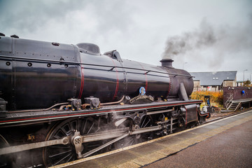 Fototapeta na wymiar Old Scottish steam train and locomotive