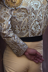 Detail of a bullfighter with a suit of lights