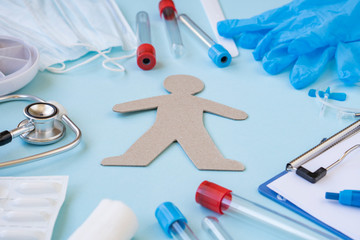 Treatment of a person from the virus and flu. Test tube for taking a blood sample.  Medications to...