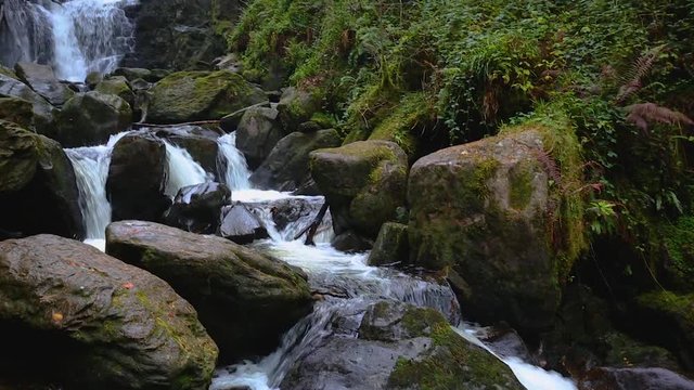 Right to left panning motion with sound of Torc Waterfall which lies near the town of Killarney in County Kerry, Ireland.