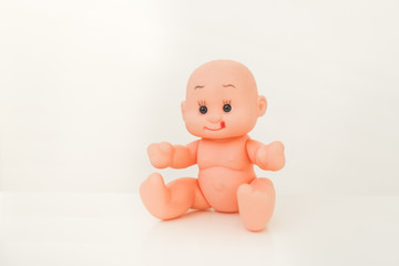 Toy for little children. Pupsik plastic for kids. Doll for girls