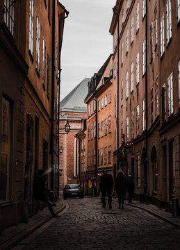 Person smoking in oldtown Stockholm