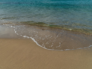 Close up of Ocean Waves on Beach