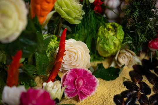 Carving. Raw vegetables cut for decoration. flowers carved from vegetables