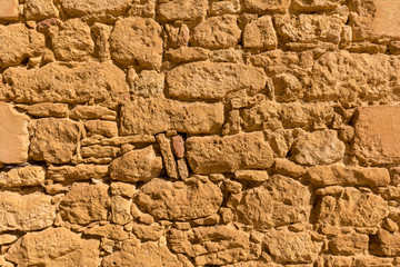 Close-up of the old stone wall in  Beynac-et-Cazenac, France