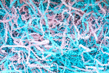 Colorful bright background. Different focus. Finely chopped colored paper