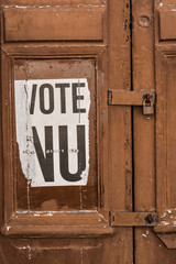 vote nu, sign on wooden door, Recife, Brazil