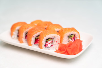 Philadelphia rolls and ginger on the plate.
