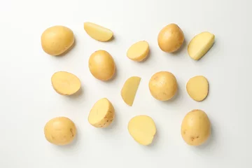 Foto op Plexiglas Flat lay with young potato on white background, top view © Atlas