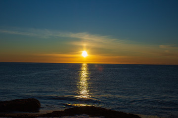 Fototapeta na wymiar calm sea with sunset in iceland