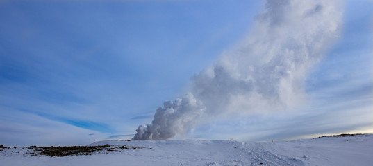 water vapour comes out of the ground in winter landscape