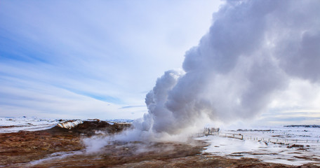 water vapour comes out of the ground in winter landscape