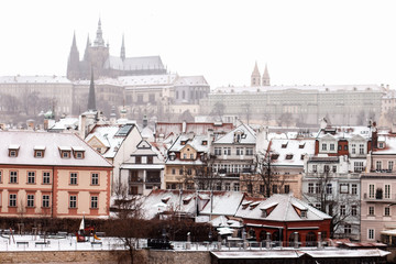 Prague old buildings in the snow
