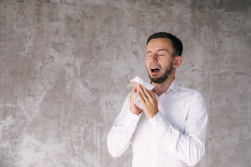 Ill upset man, blowing running nose, got fever, caught cold, sne