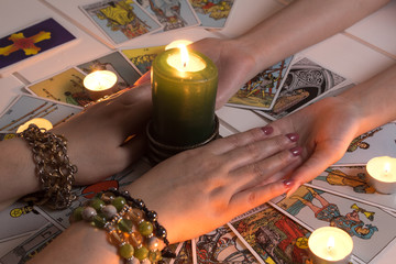 Bangkok,Thailand,March.15.20.Women's hands and Tarot cards. The Gypsy lays out Tarot cards and...