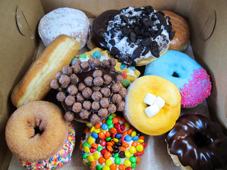 Colorful donuts in the box