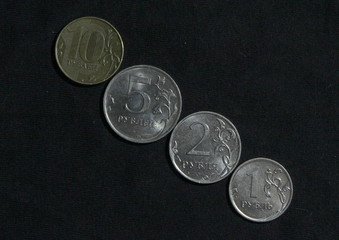 Russian Rubles on the black background. Coins 1, 2, 5, 10. :The bank of Russia